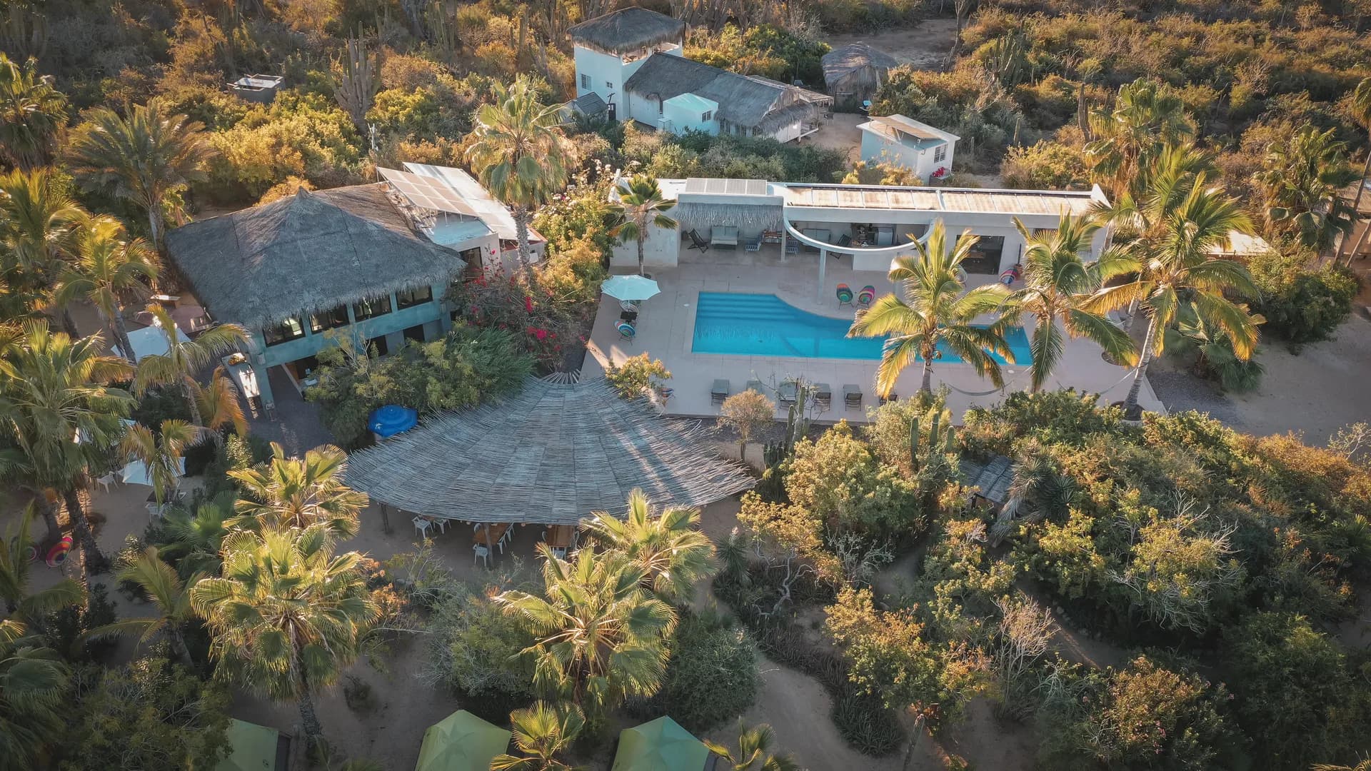 Crystal-clear pool surrounded by the Baja Pacific landscape